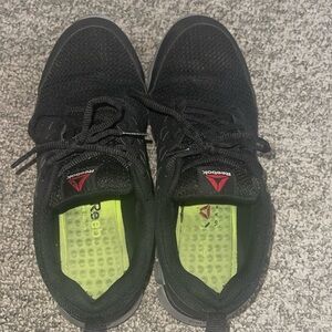 women’s 9.5, men’s 7.5 Reebok steel toe shoes.